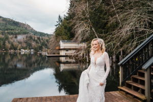 A bride walks out to meet her groom on Lake Sutherland