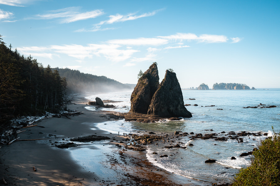 Two large sea stacks tower above the beach at Rialto Beach in Olympic National Park
